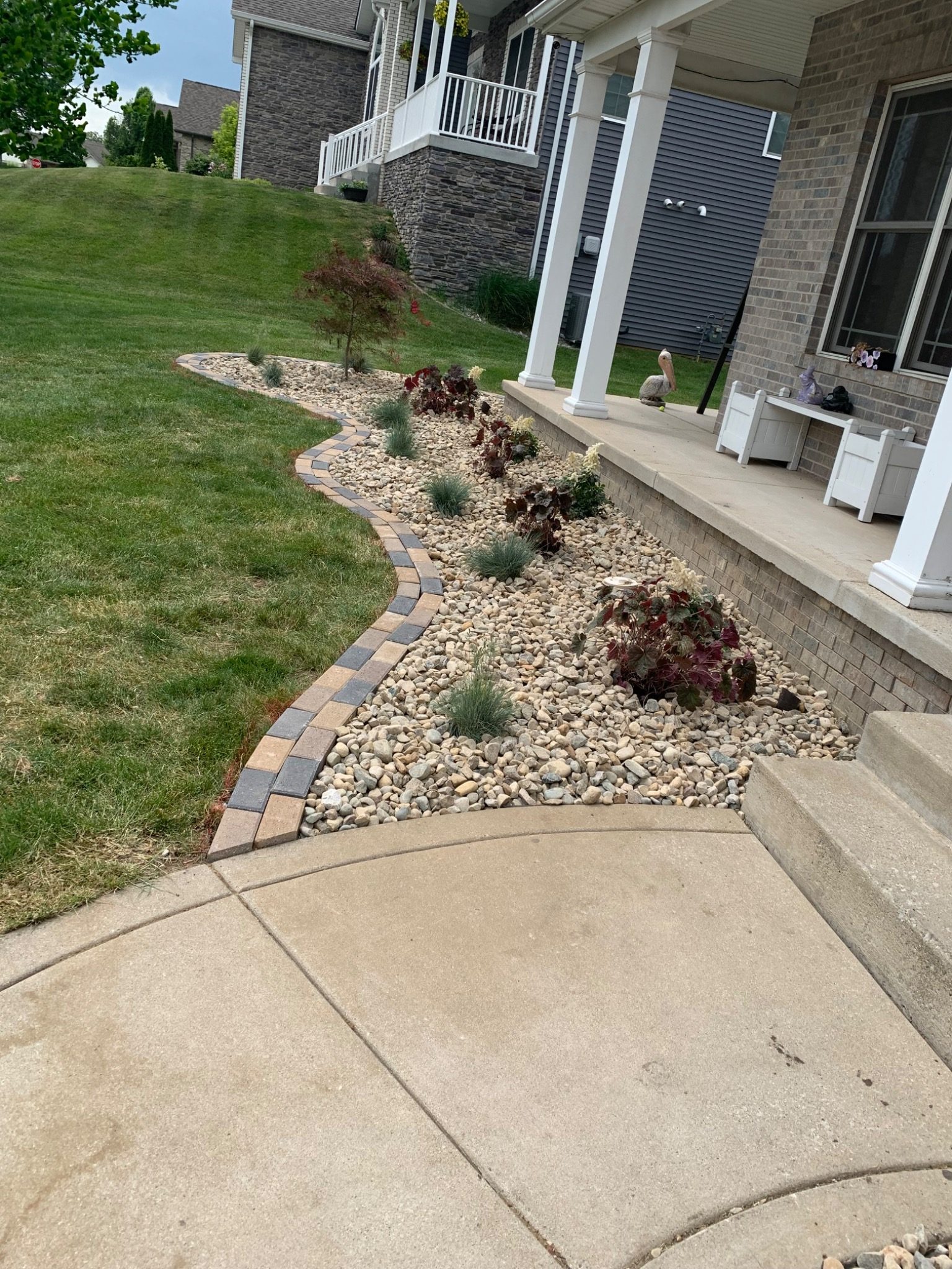 Decorative rock landscape bed with plants