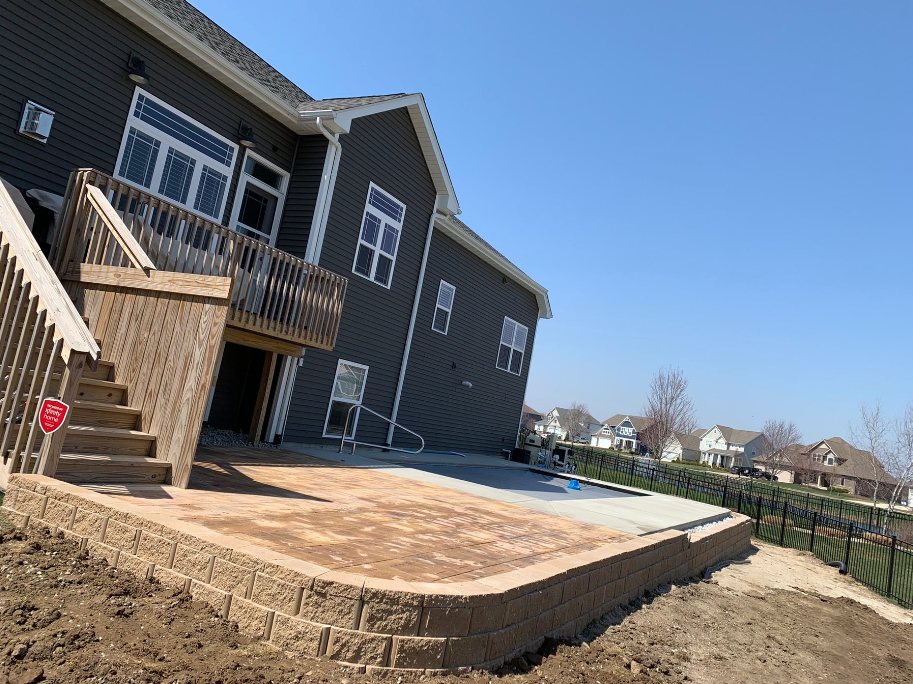Completed paver patio and retaining wall project